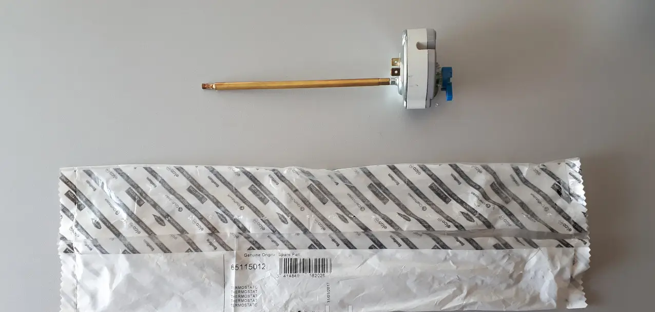 termostato lungo rotondo grigio